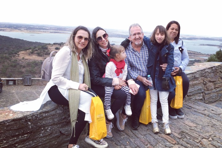 a group of people sitting posing for the camera