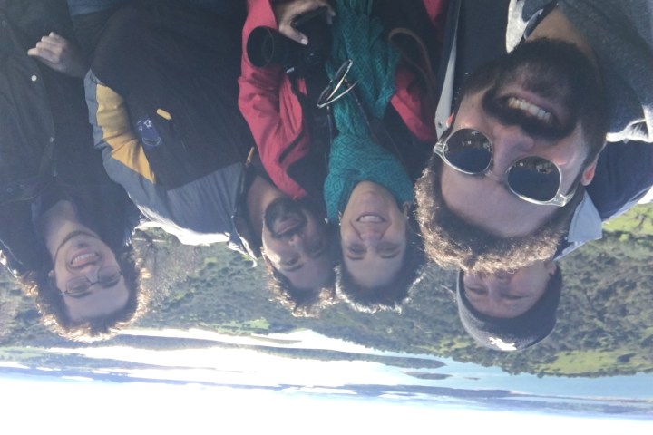 a group of people posing for the camera