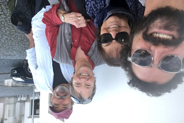 a group of people posing for the camera